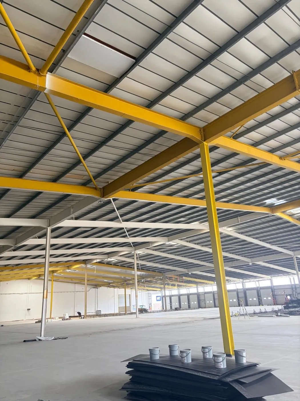 Warehouse ceiling and roof structure after a high-level clean